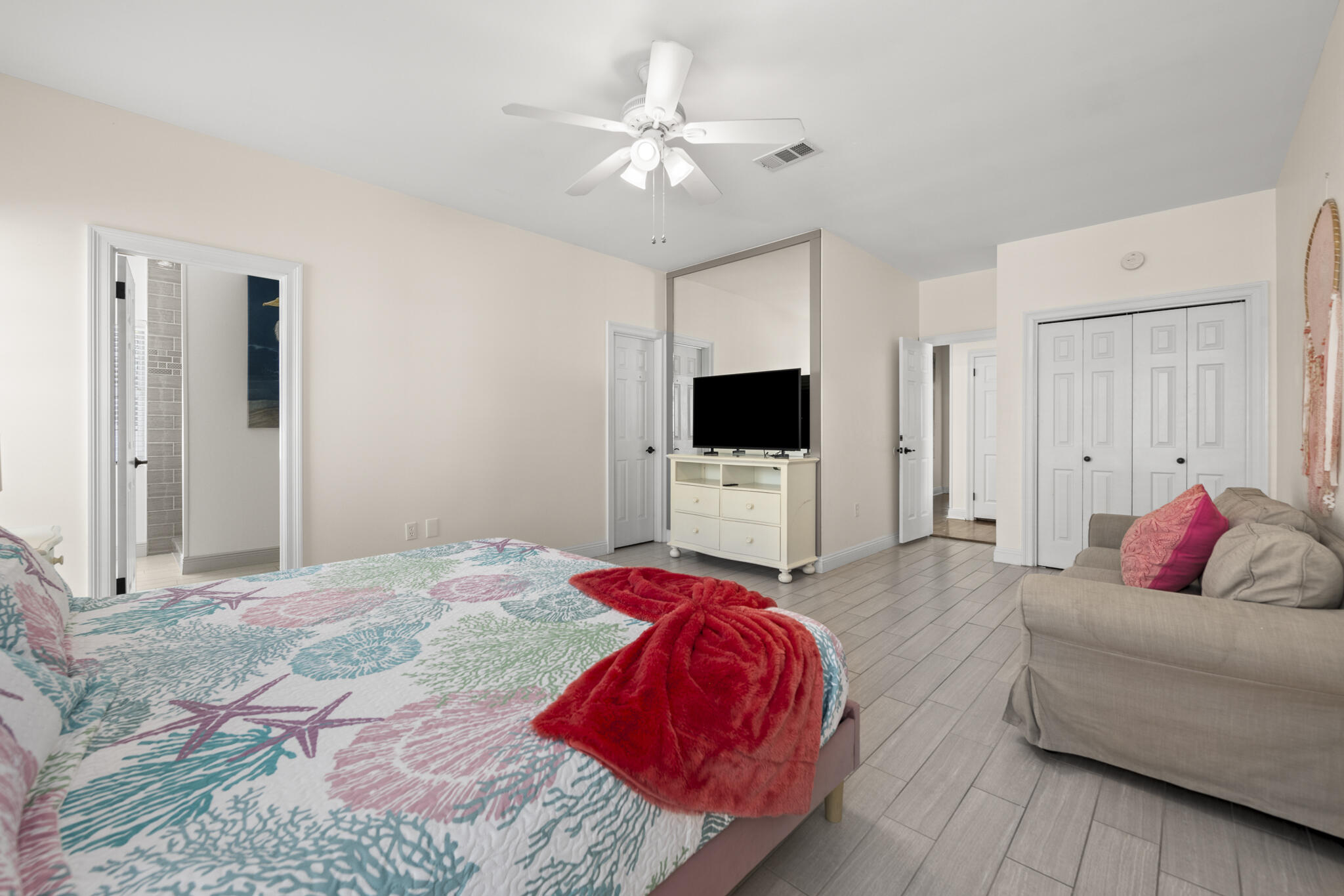 4431 Luke Avenue Destin, FL 32541 - Photo 37 of 100 a bedroom with a bed and a flat screen tv
