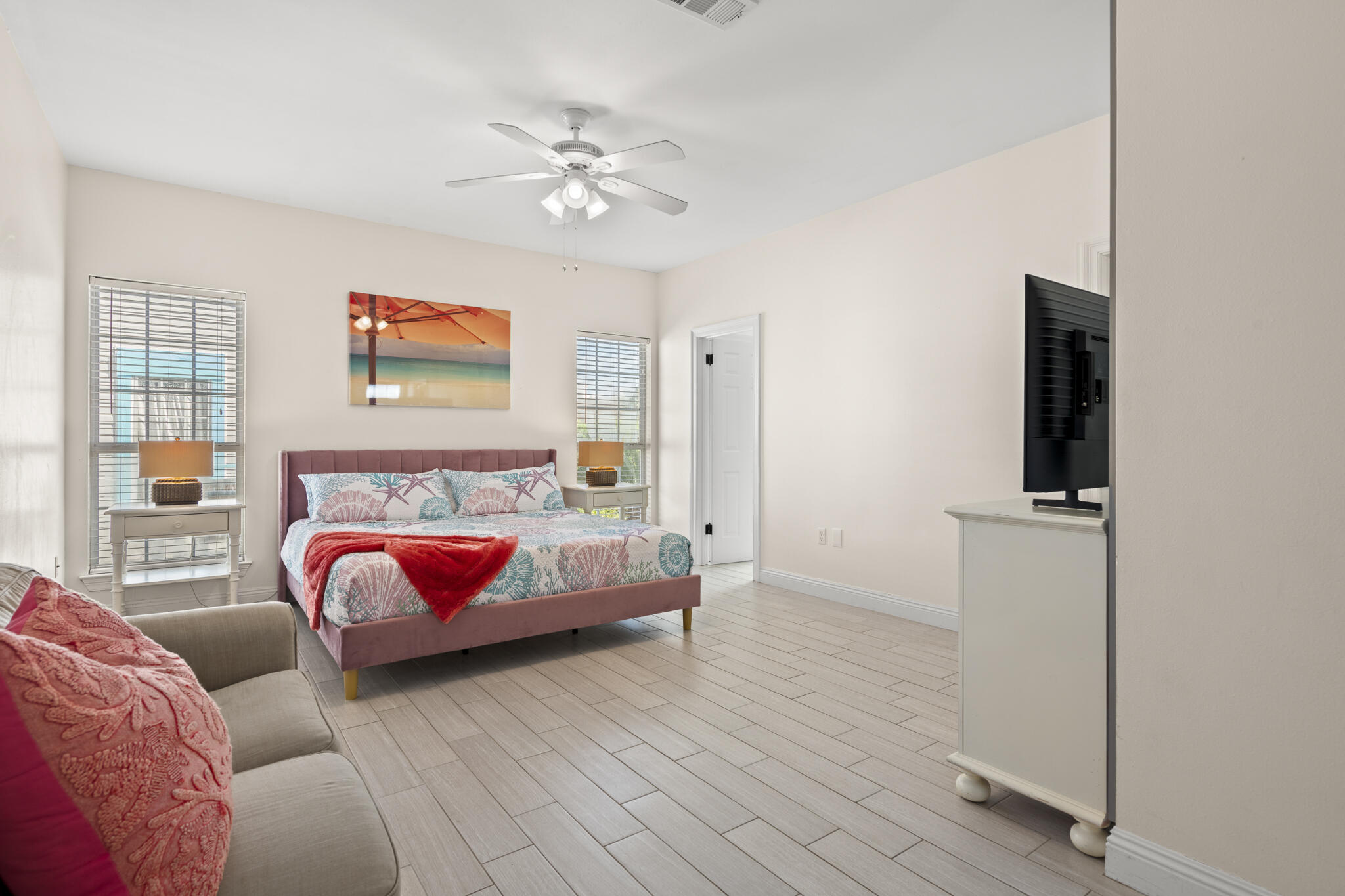 4431 Luke Avenue Destin, FL 32541 - Photo 40 of 100 a bedroom with furniture and flat screen tv