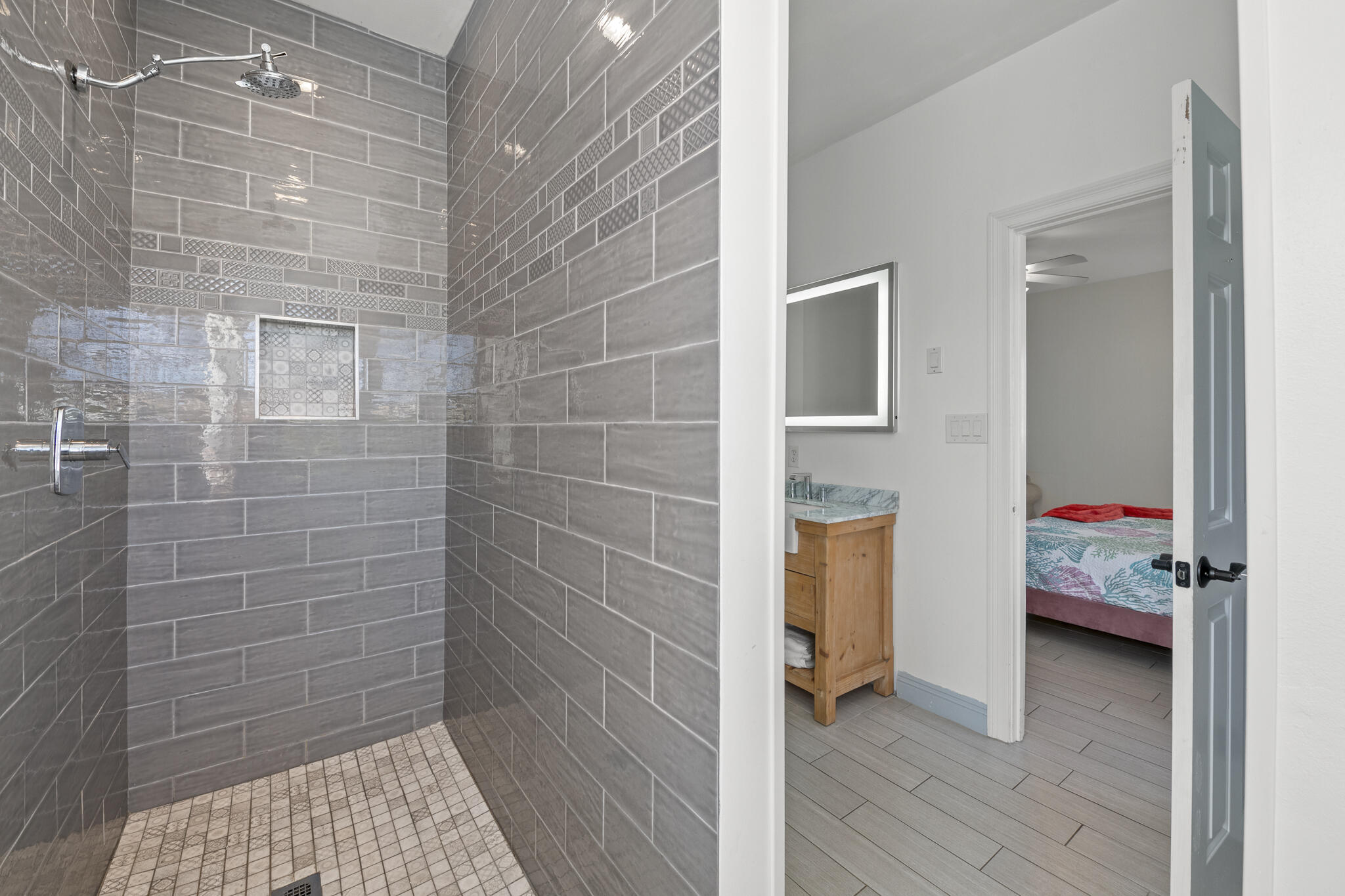 4431 Luke Avenue Destin, FL 32541 - Photo 42 of 100 a bathroom with a sink and a shower
