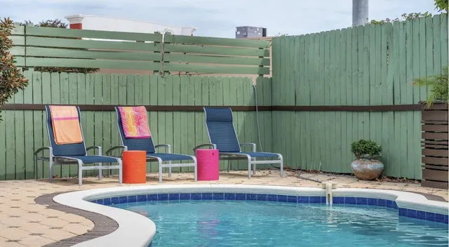 an aerial view of residential building and ocean