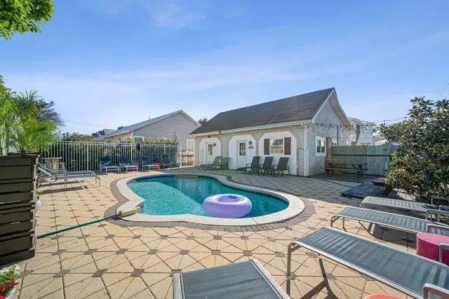 an aerial view of residential building and parking space