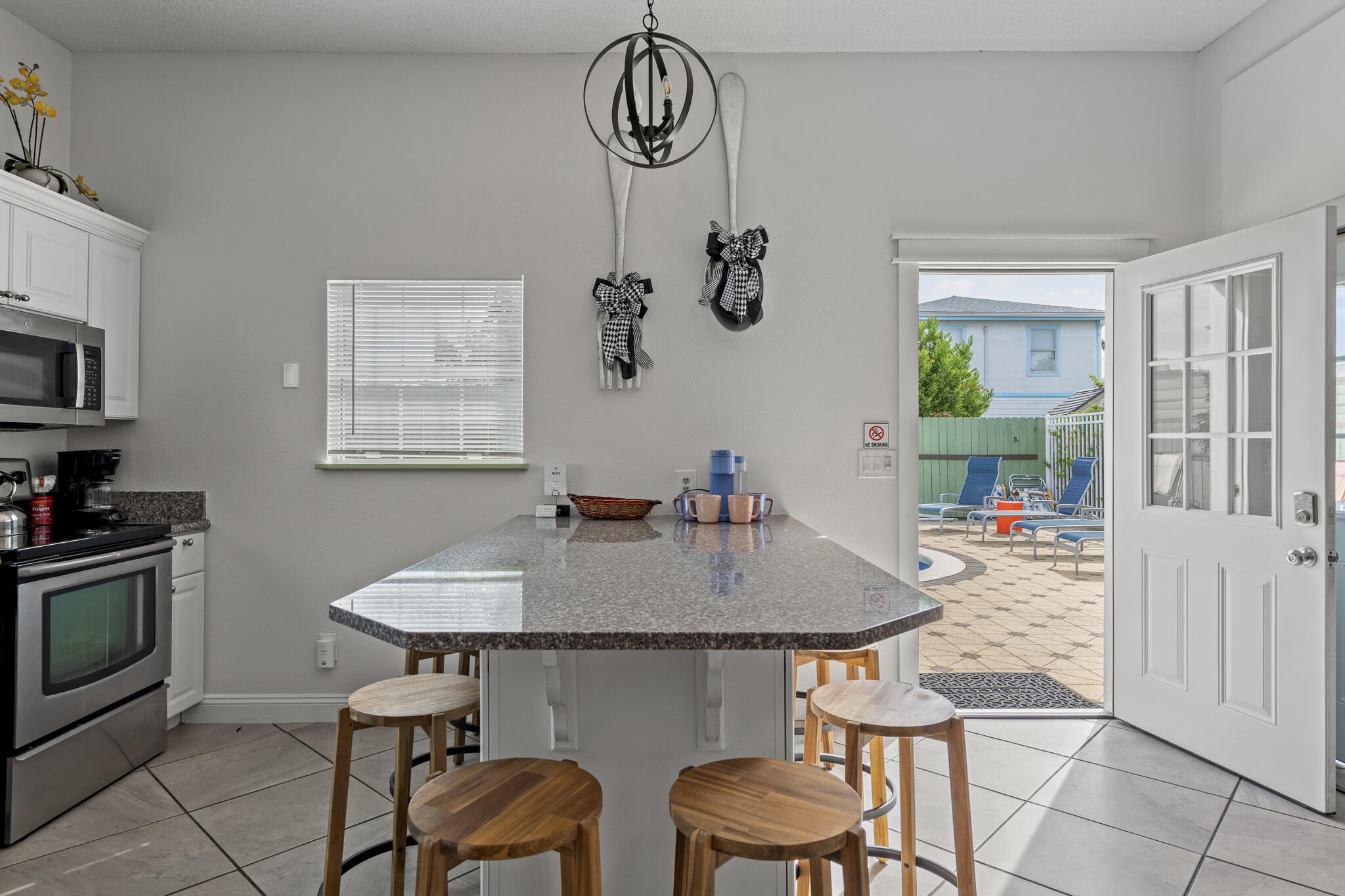 4431 Luke Avenue Destin, FL 32541 - Photo 78 of 100 a view of a dining room with furniture