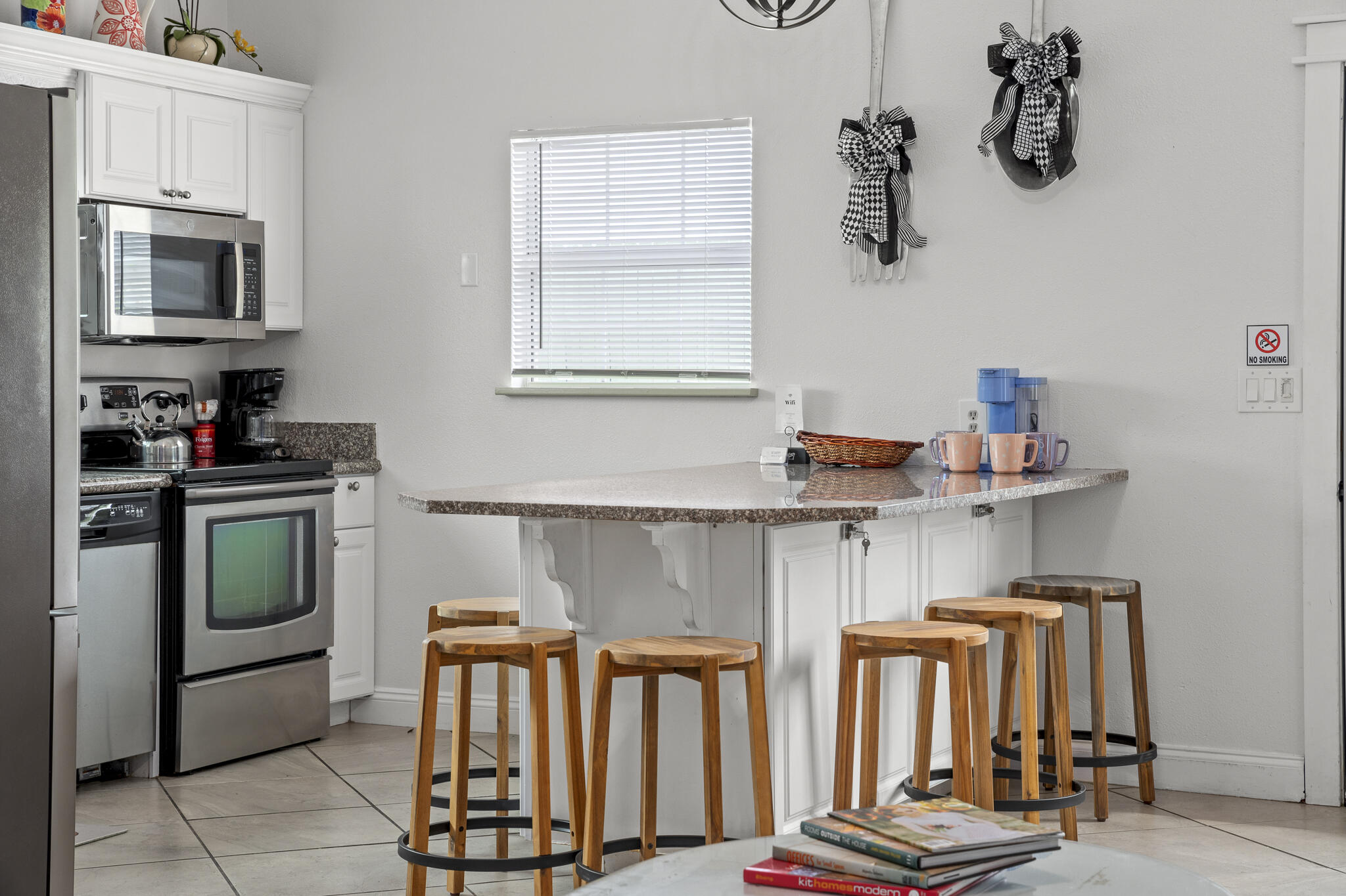 4431 Luke Avenue Destin, FL 32541 - Photo 81 of 100 a kitchen with appliances and cabinets