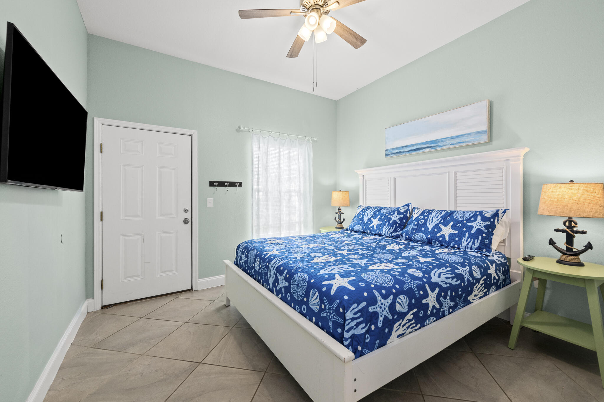 4431 Luke Avenue Destin, FL 32541 - Photo 89 of 100 a bed room with a bed and a television