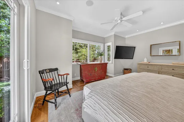 a large kitchen with kitchen island a sink a counter space and stainless steel appliances