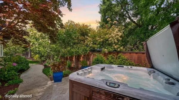 a view of a house with backyard