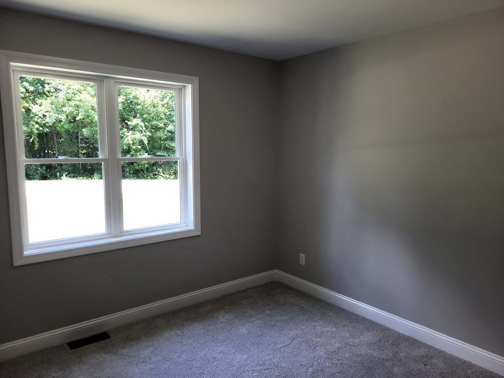 17 Harwood Farm Road Southbridge, MA 01550 - Photo 11 of 23 an empty room with a window