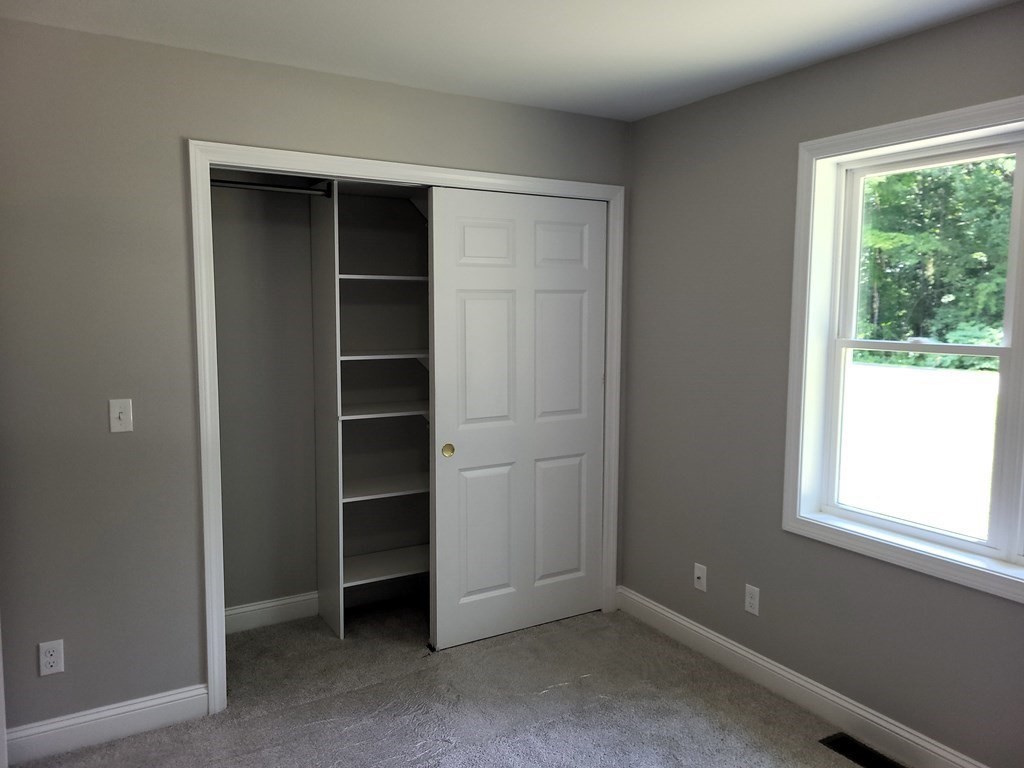 17 Harwood Farm Road Southbridge, MA 01550 - Photo 12 of 23 a view of an empty room with a window