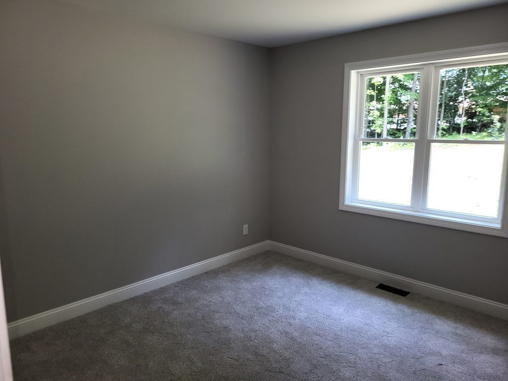 17 Harwood Farm Road Southbridge, MA 01550 - Photo 13 of 23 an empty room with a window