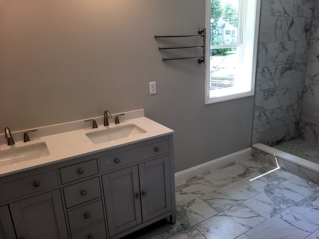 17 Harwood Farm Road Southbridge, MA 01550 - Photo 17 of 23 a bathroom with a sink toilet and window