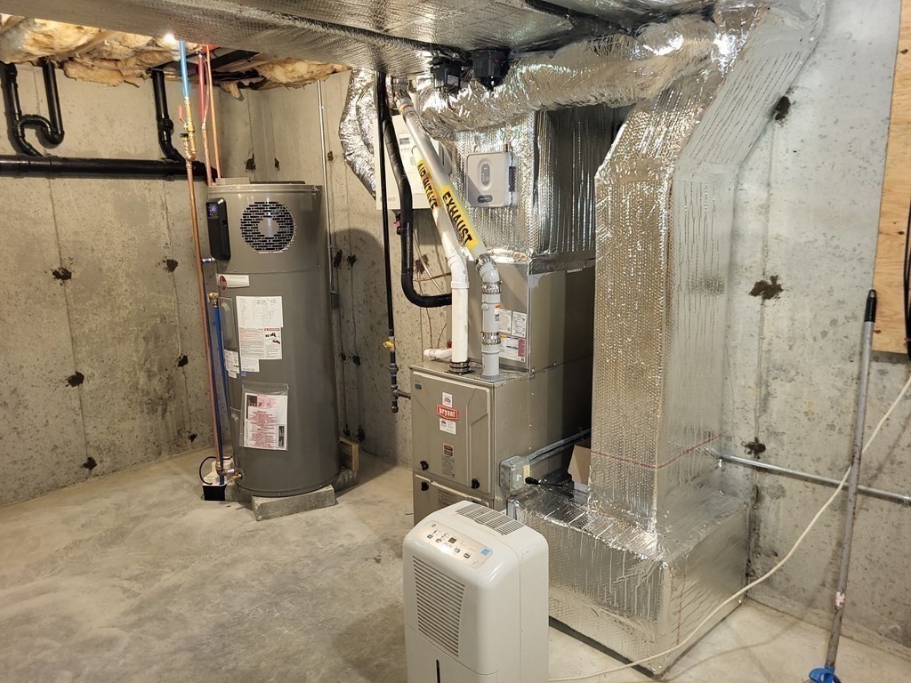 17 Harwood Farm Road Southbridge, MA 01550 - Photo 21 of 23 a bathroom with a mirror a sink and shower