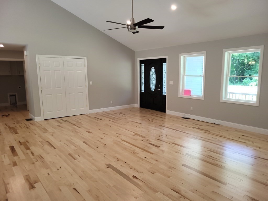 17 Harwood Farm Road Southbridge, MA 01550 - Photo 6 of 23 a view of empty room with wooden floor and fan