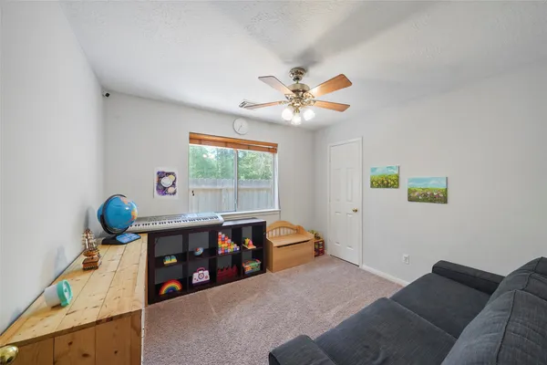 a view of a swimming pool with an outdoor space and seating area