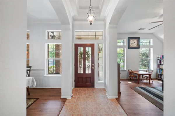 a view of a livingroom with furniture and windows