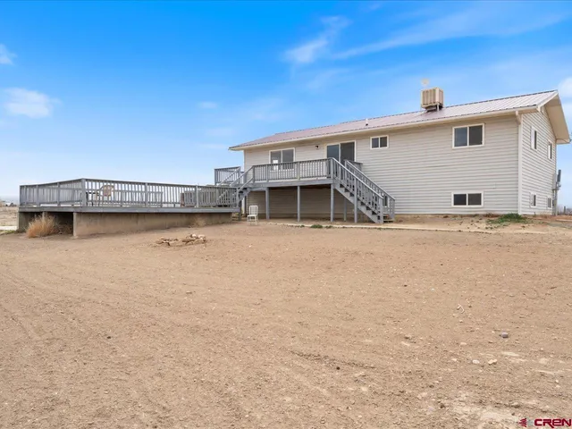 a view of a house with a terrace