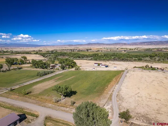 a view of an ocean and city