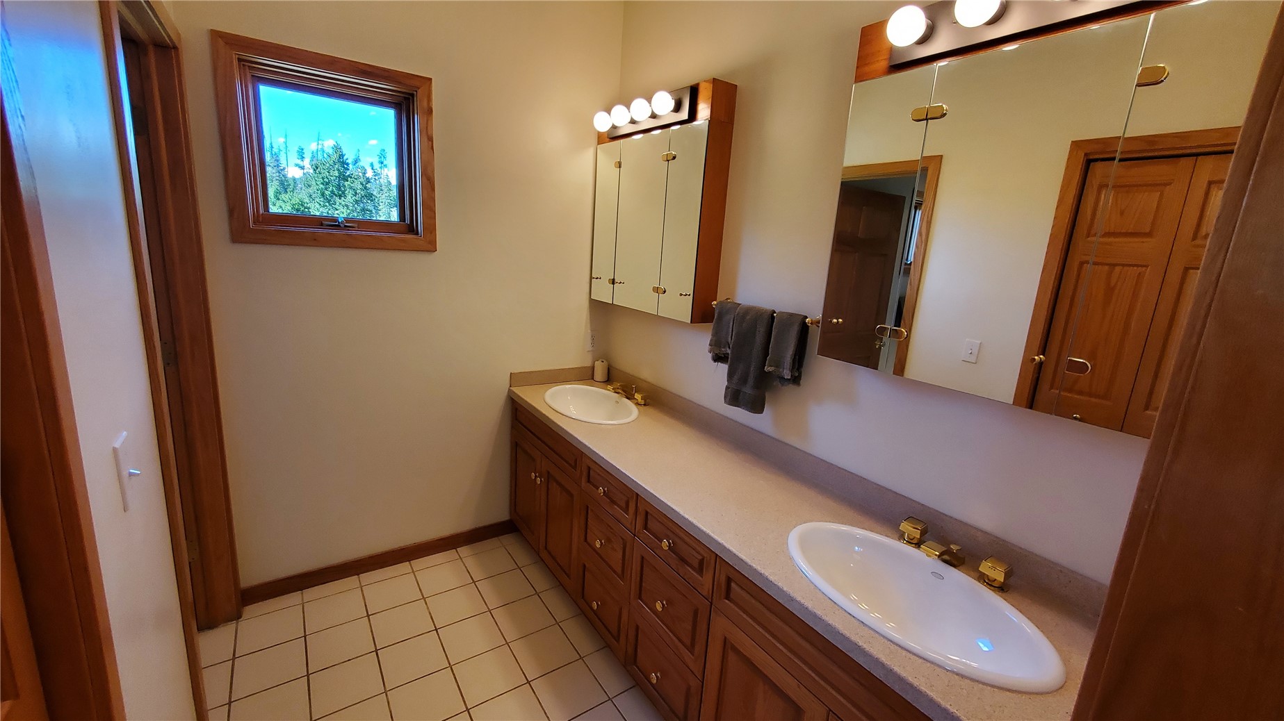 1228 Emerald Road Silverthorne, CO 80498 - Photo 38 of 50 Double sinks in the upstairs guest wing