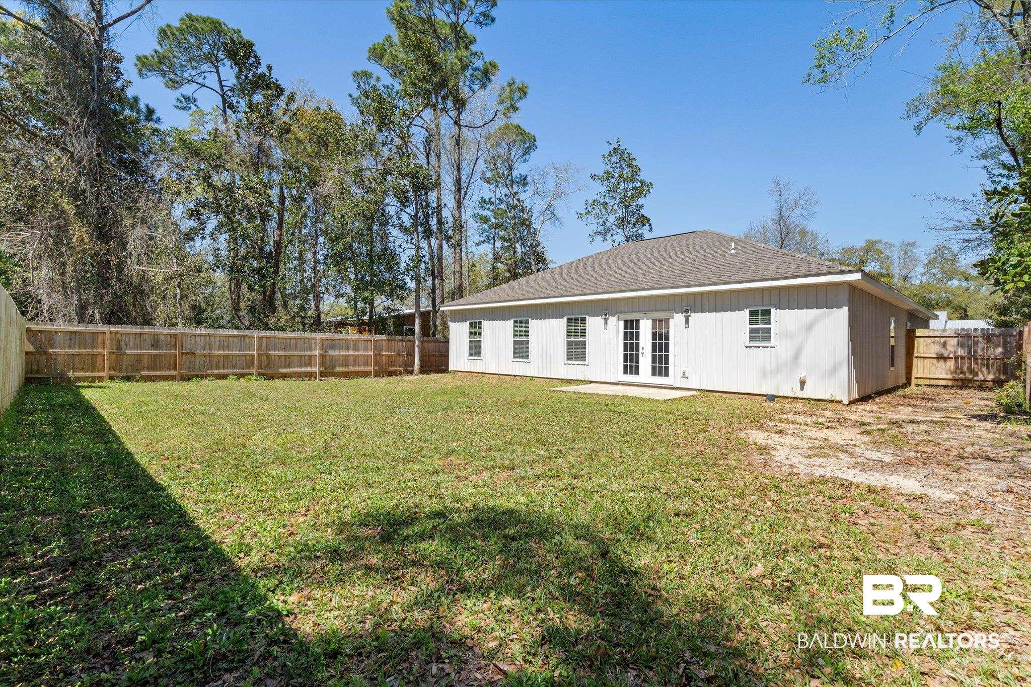 409 Oakleigh Circle Foley, AL 36535 - Photo 18 of 21 Fenced Backyard