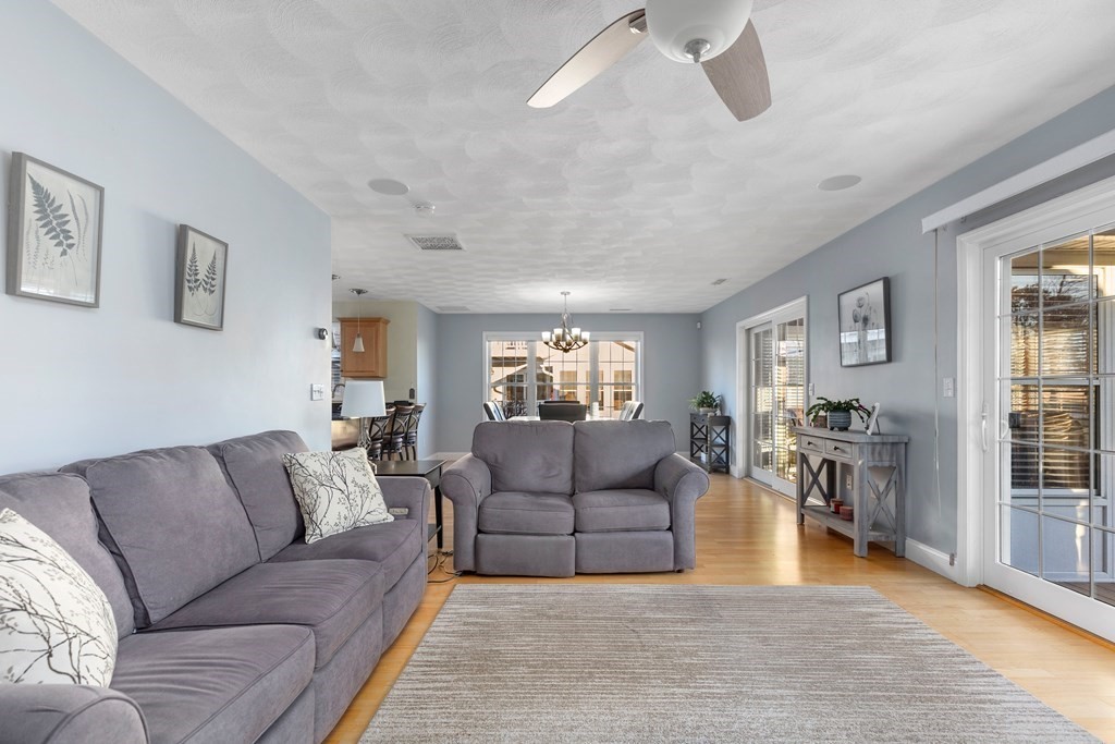 170 Beach Road, Unit 36 Salisbury, MA 01952 - Photo 16 of 40 a living room with furniture and a fireplace