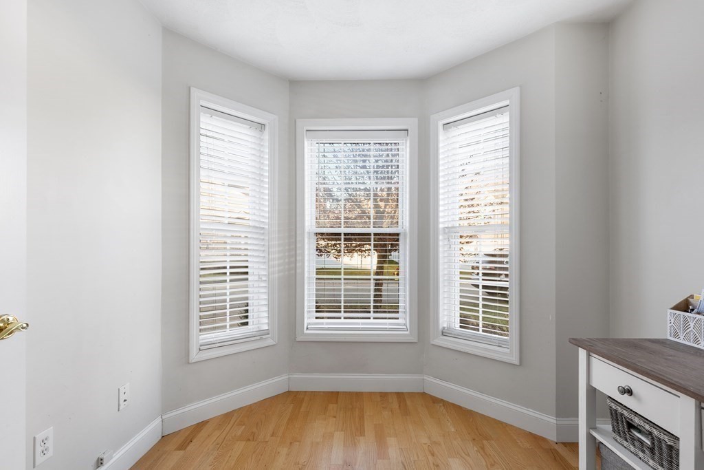 170 Beach Road, Unit 36 Salisbury, MA 01952 - Photo 7 of 40 a view of a room that has a bed and a window in it