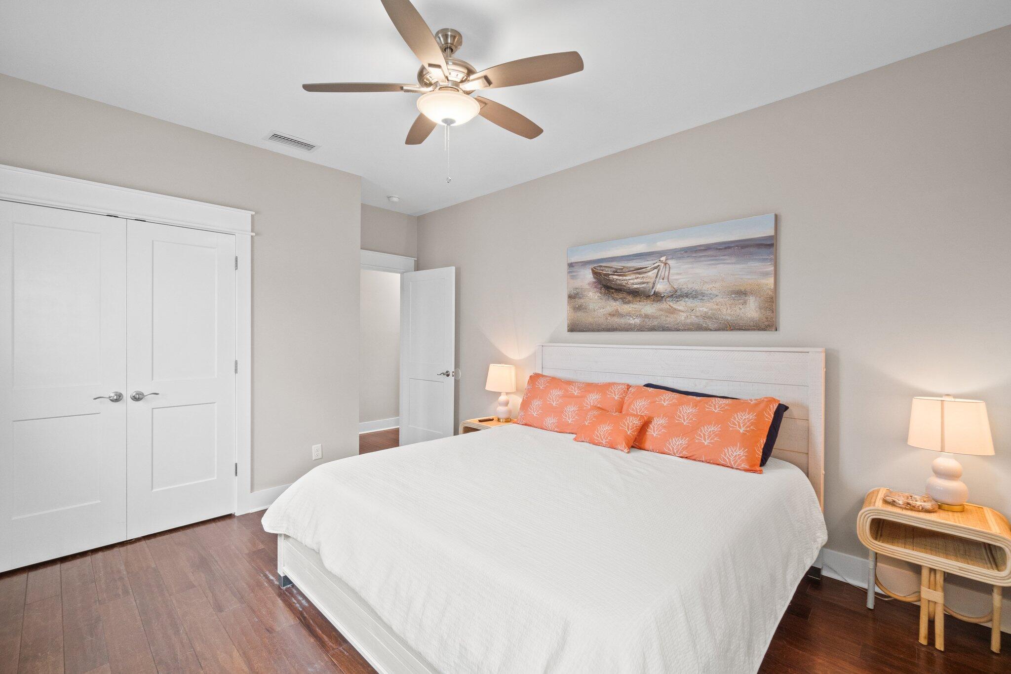 39 Seaview Dr Inlet Beach Inlet Beach, FL 32461 - Photo 29 of 62 a bedroom with a bed and wooden floor