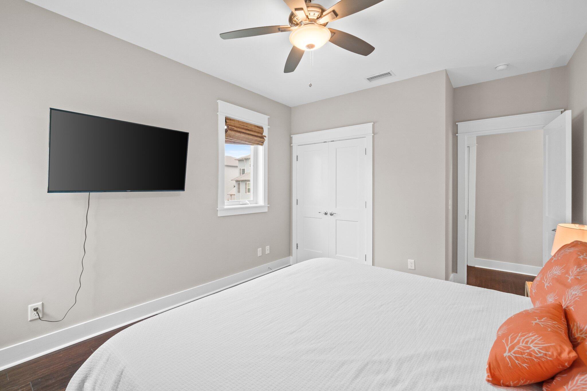 39 Seaview Dr Inlet Beach Inlet Beach, FL 32461 - Photo 30 of 62 a bedroom with a bed and a flat screen tv