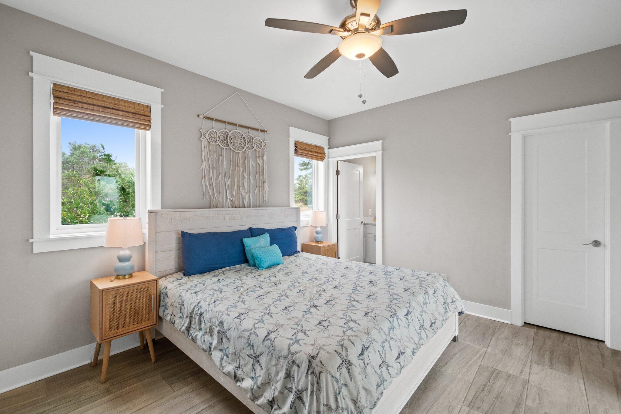 39 Seaview Dr Inlet Beach Inlet Beach, FL 32461 - Photo 5 of 62 a bedroom with a large bed and a window