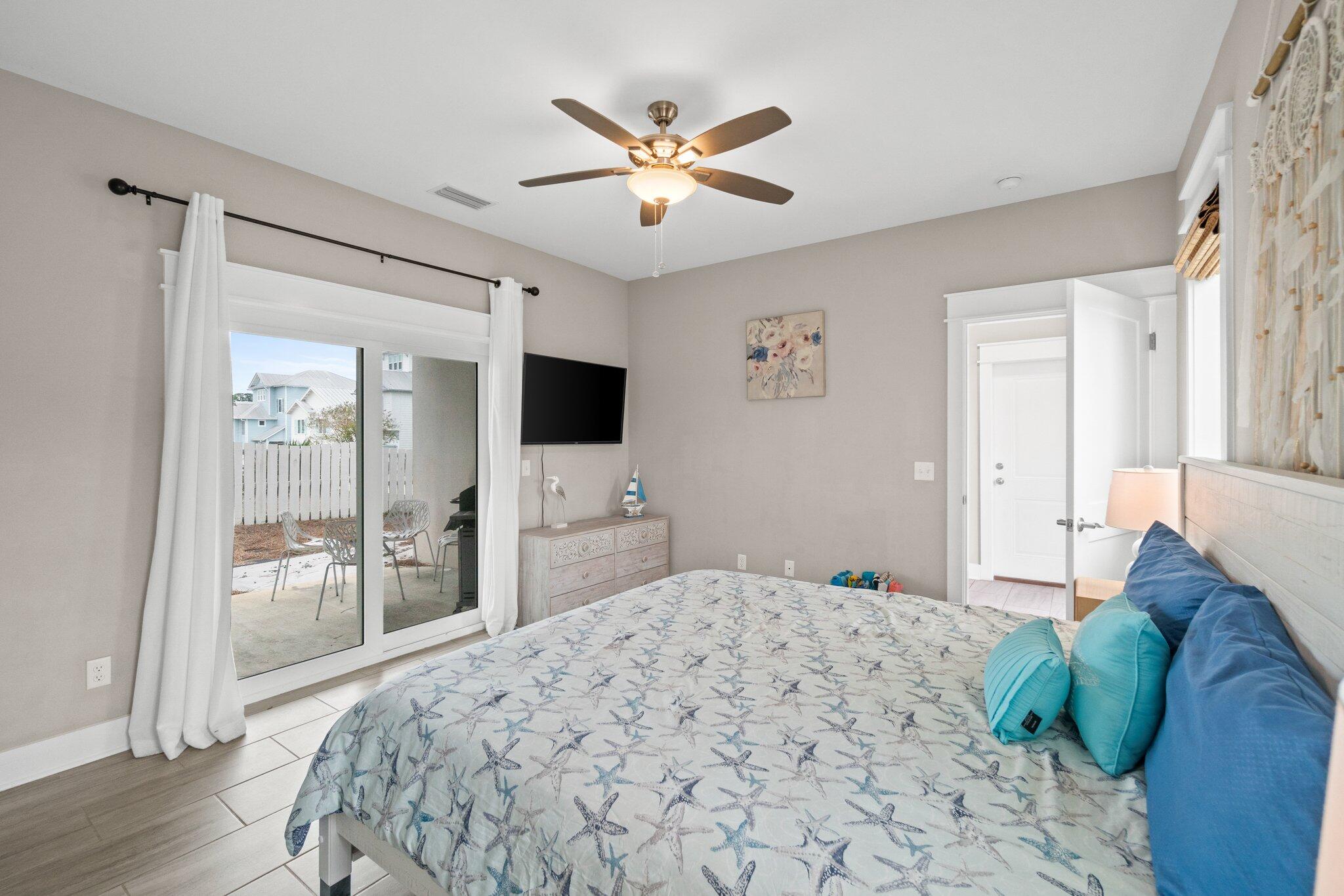 39 Seaview Dr Inlet Beach Inlet Beach, FL 32461 - Photo 6 of 62 a bedroom with a bed and a flat screen tv
