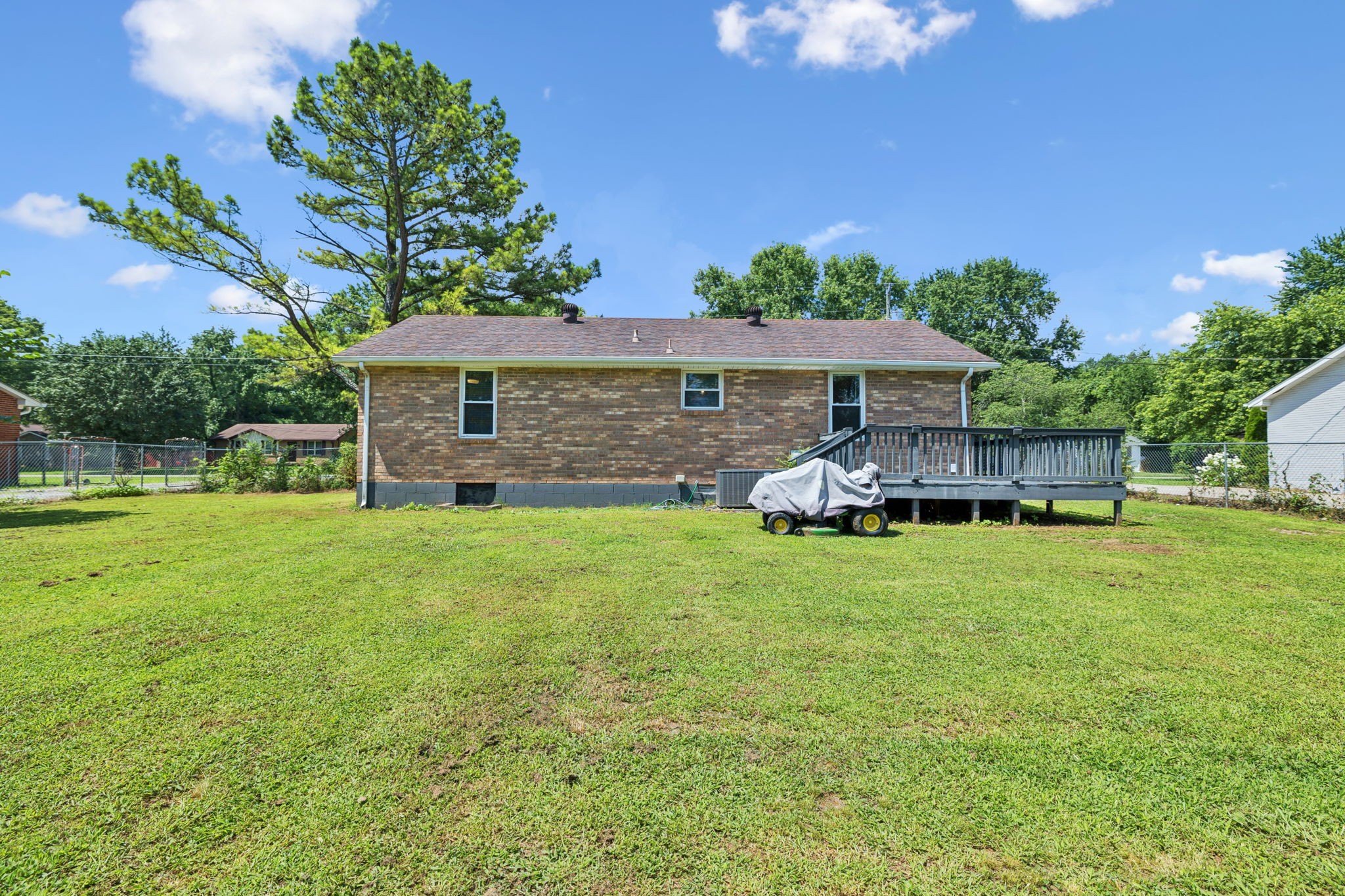 8124 Cooper Drive Murfreesboro, TN 37129 - Photo 3 of 19 a front view of a house with garden