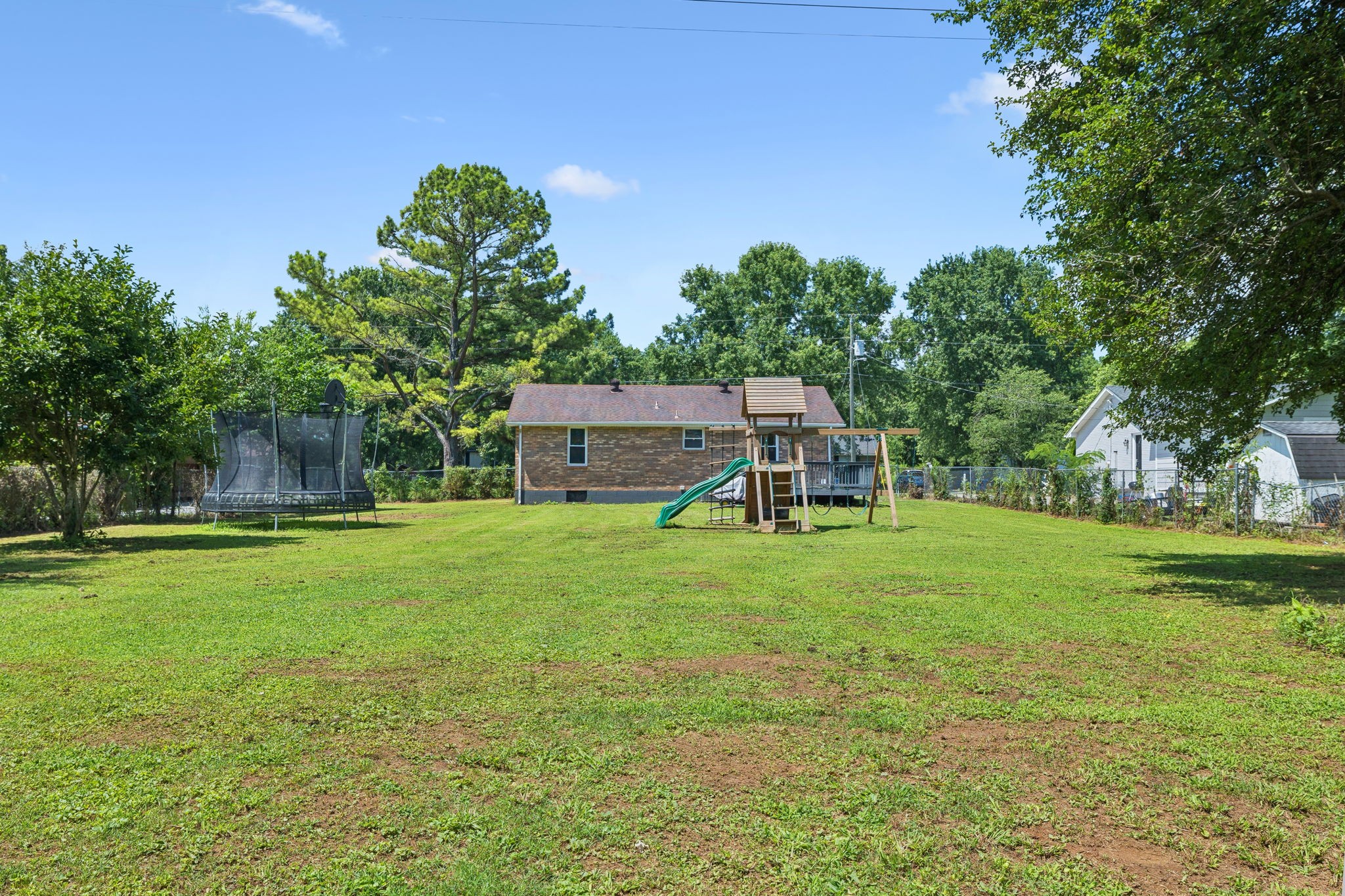 8124 Cooper Drive Murfreesboro, TN 37129 - Photo 4 of 19 a view of a house with a big yard