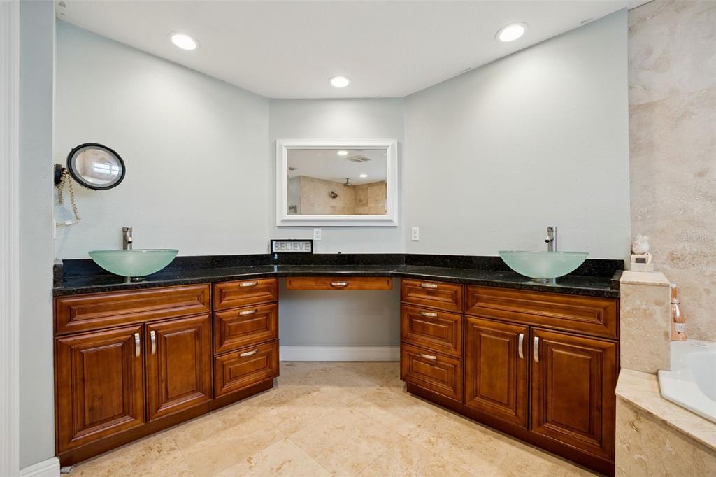 1050 Crystal Bowl Circle Casselberry, FL 32707 - Photo 22 of 64 a kitchen with stainless steel appliances granite countertop a sink and cabinets