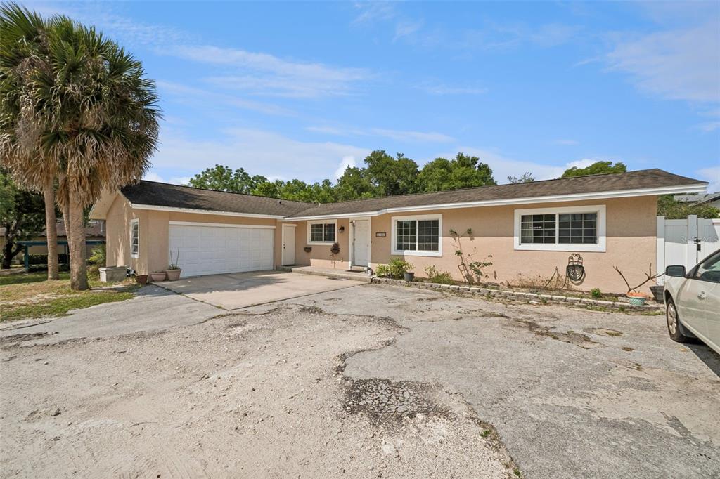1050 Crystal Bowl Circle Casselberry, FL 32707 - Photo 3 of 64 front view of a house with a patio