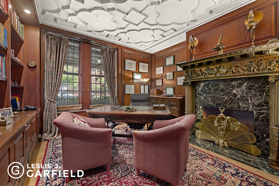 850 Park Avenue, Unit 1A/F Manhattan, NY 10075 - Photo 9 of 11 a living room with furniture a fireplace and a table