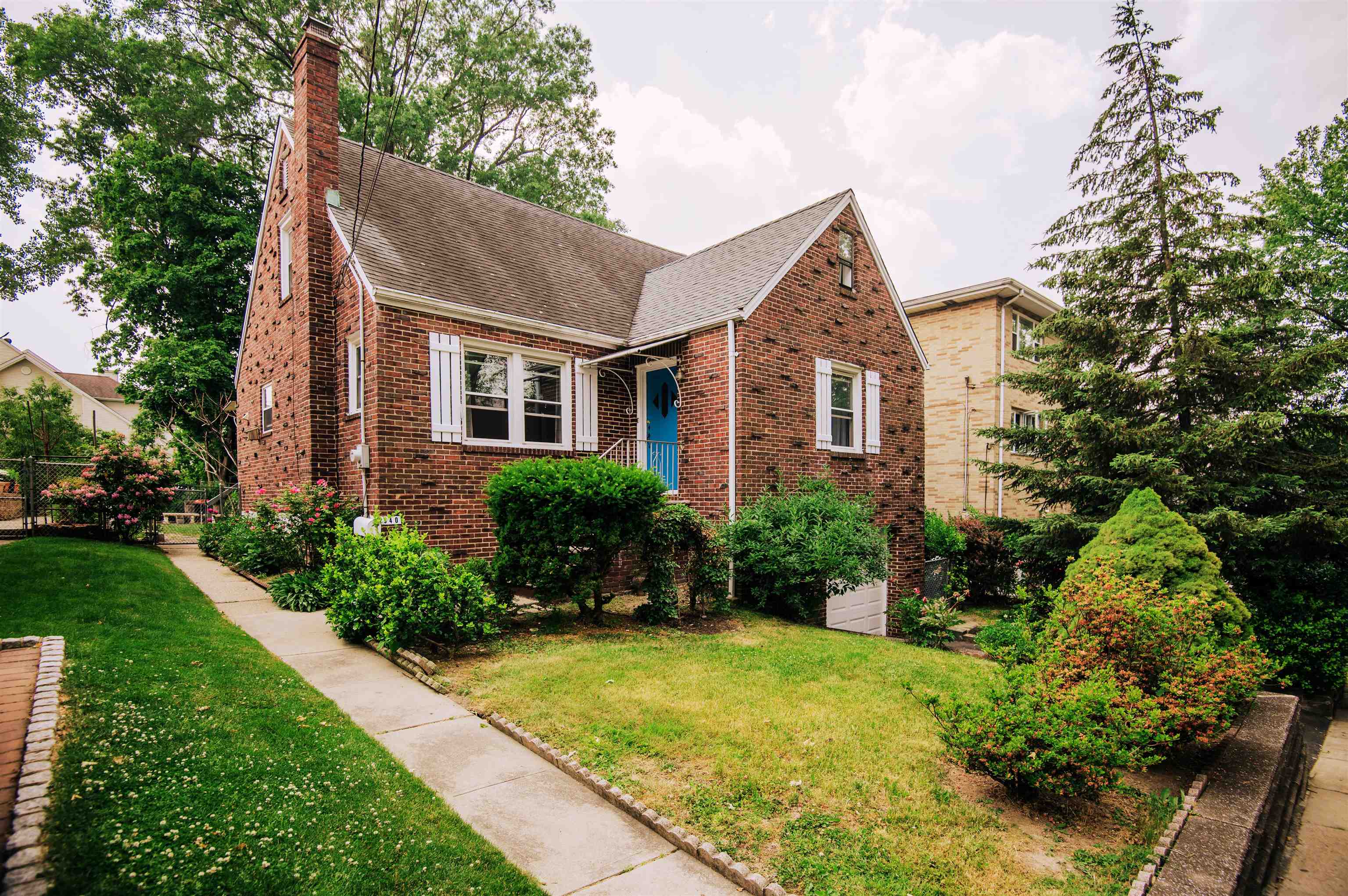540 Day Avenue Ridgefield, NJ 07657 - Photo 1 of 42 a front view of a house with garden
