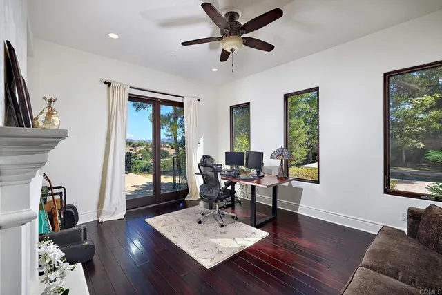 a bed room with a bed and a tv