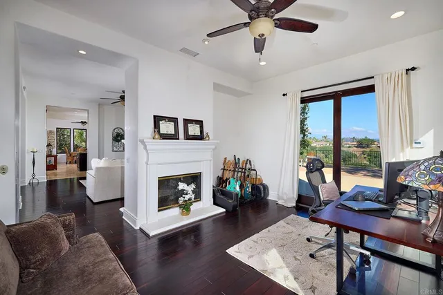 a bedroom with a bed and a fireplace