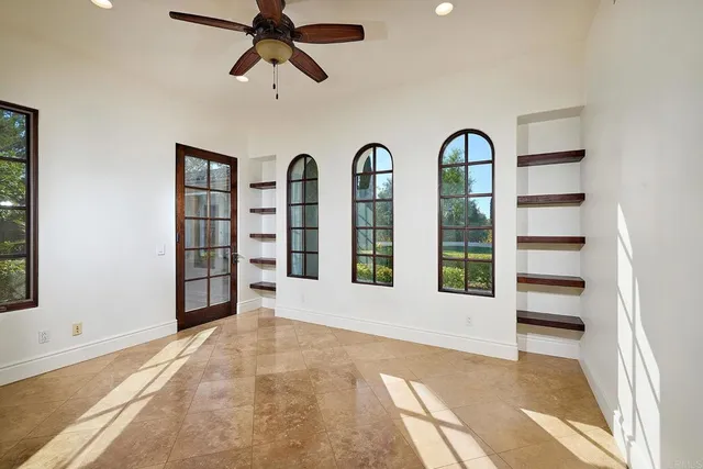 a bedroom with a bed furniture and a window