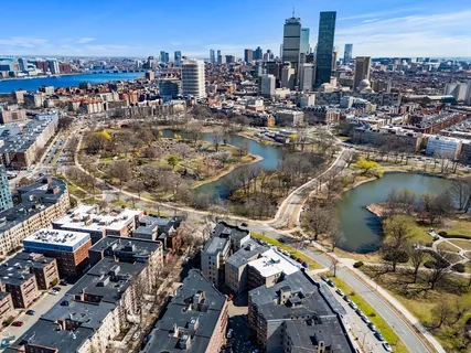 an aerial view of a city with lots of residential buildings