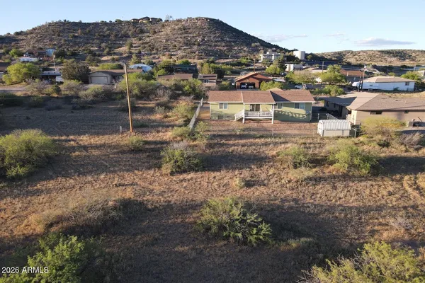 a view of residential houses with outdoor space