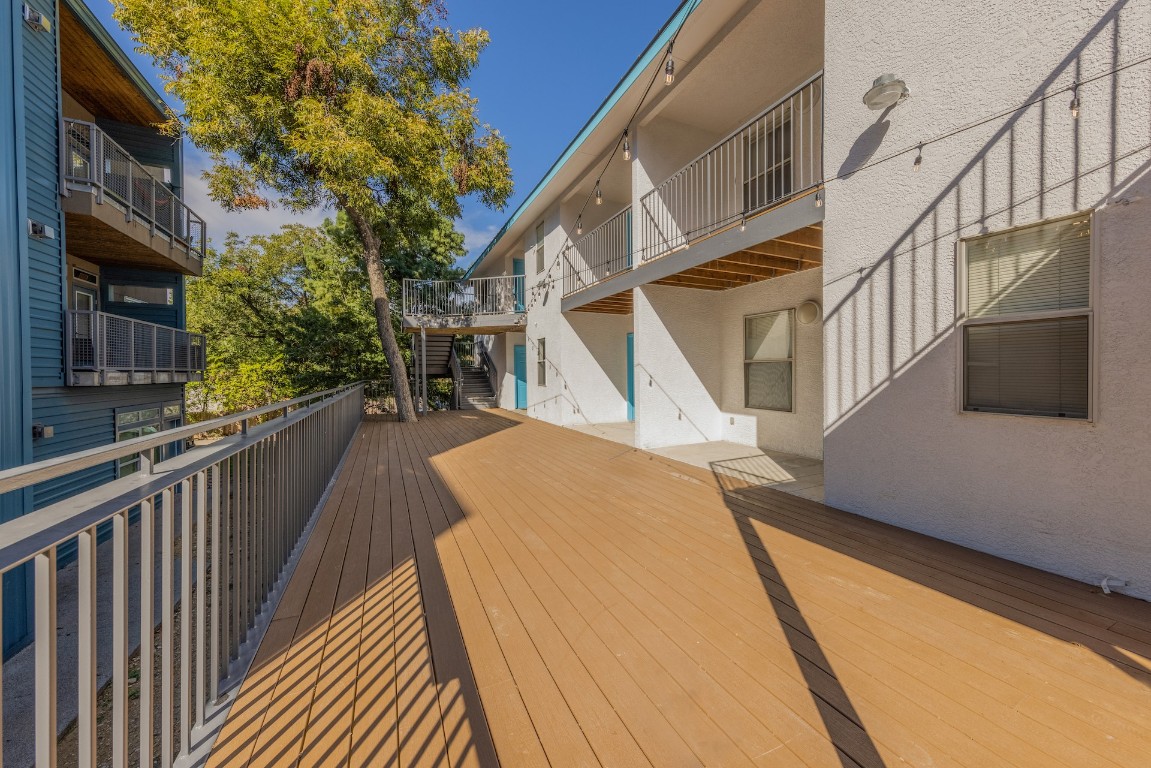 2824 Rio Grande Street, Unit 101 Austin, TX 78705 - Photo 3 of 10 a view of a house with wooden stairs