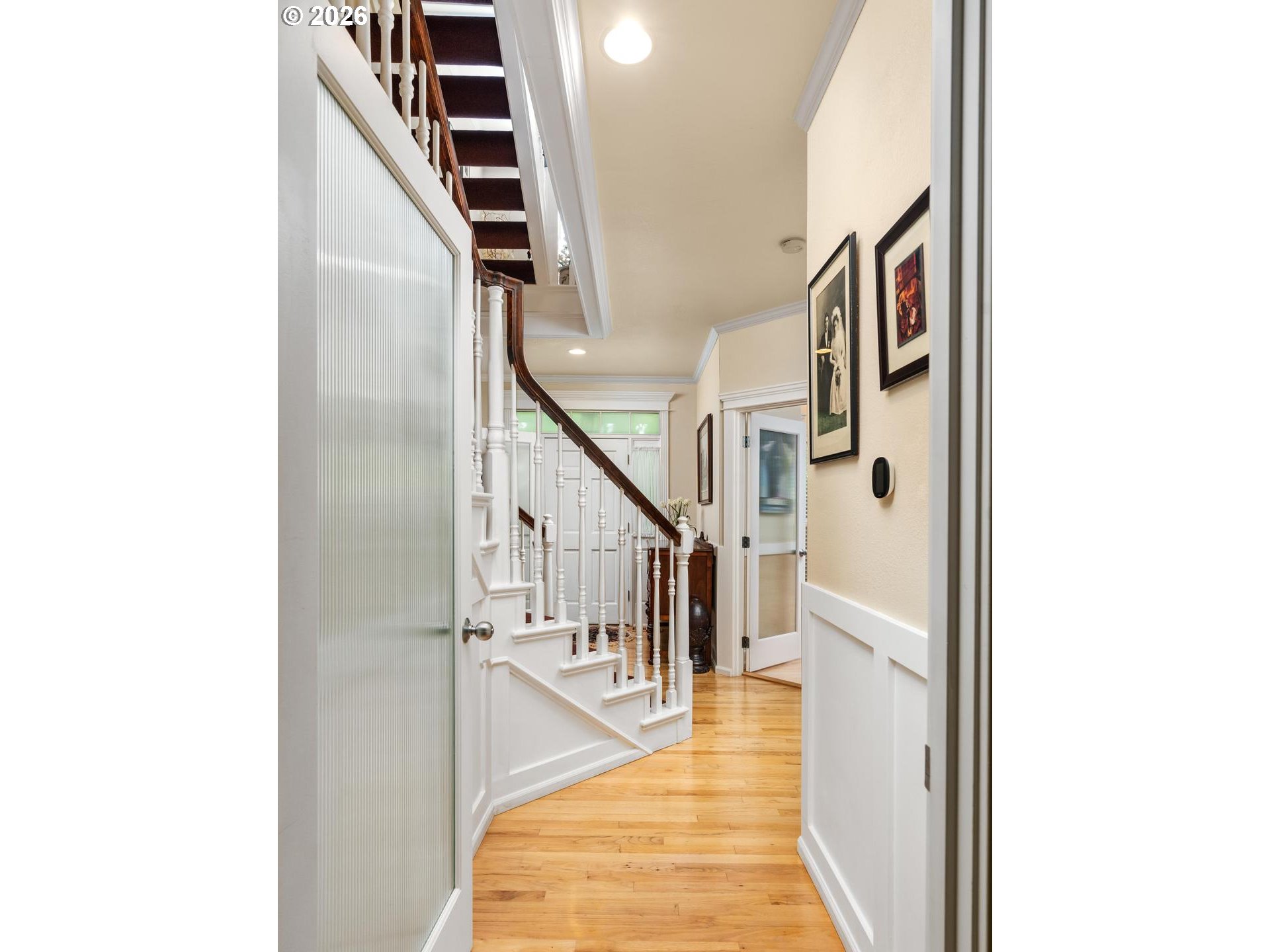 16042 Southwest Waxwing Way Beaverton, OR 97007 - Photo 15 of 48 a view of a hallway with staircase