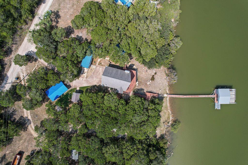 3617 Brandy Road Caddo, TX 76429 - Photo 39 of 40 Aerial overview of property's location with a tree filled landscape and a large body of water