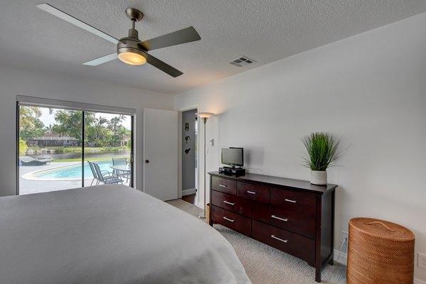 1520 Cormorant Road Delray Beach, FL 33444 - Photo 18 of 35 Master Bedroom View of Water and Pool