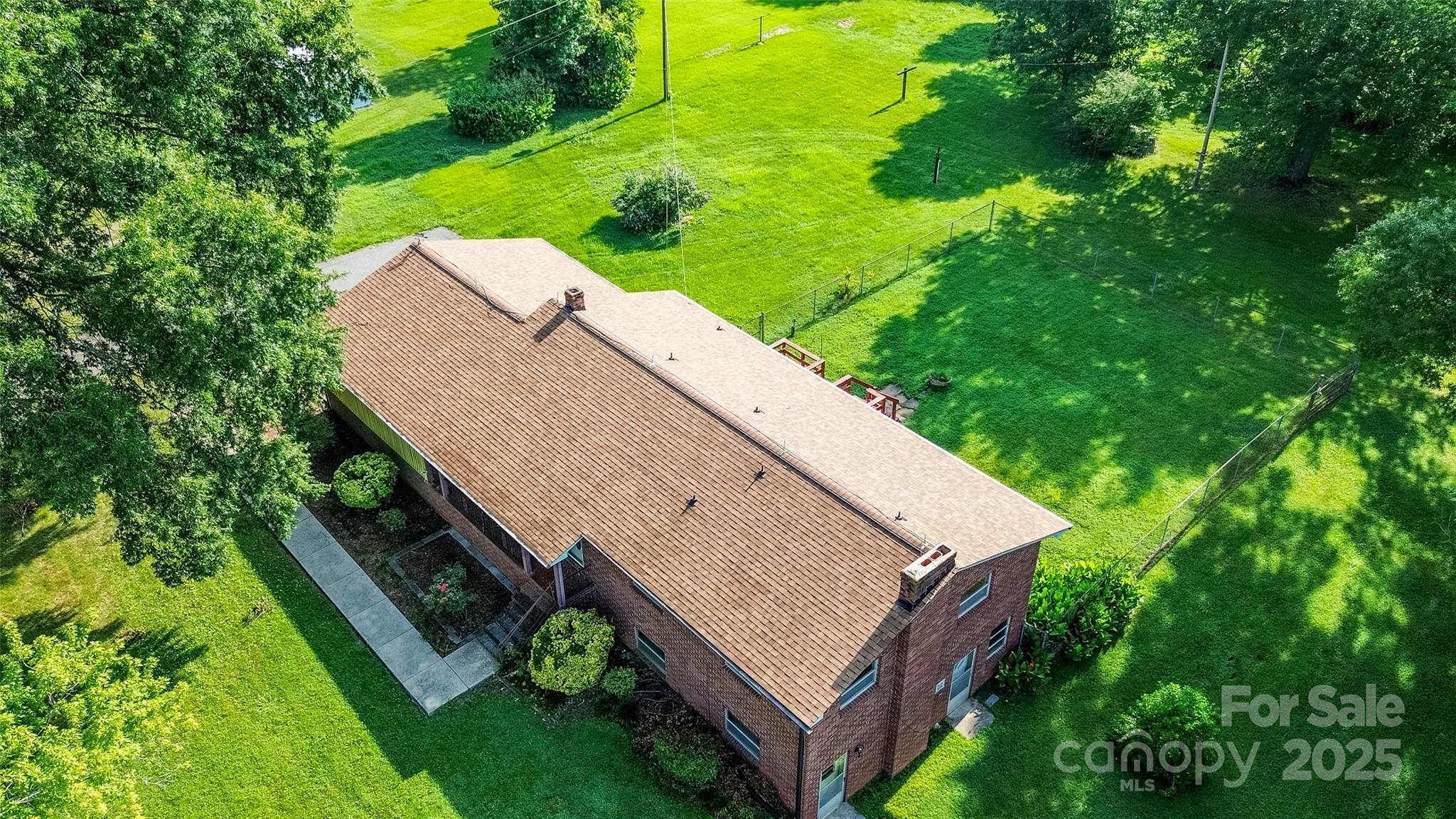 615 Bell Farm Road Statesville, NC 28625 - Photo 2 of 46 a view of a backyard with plants