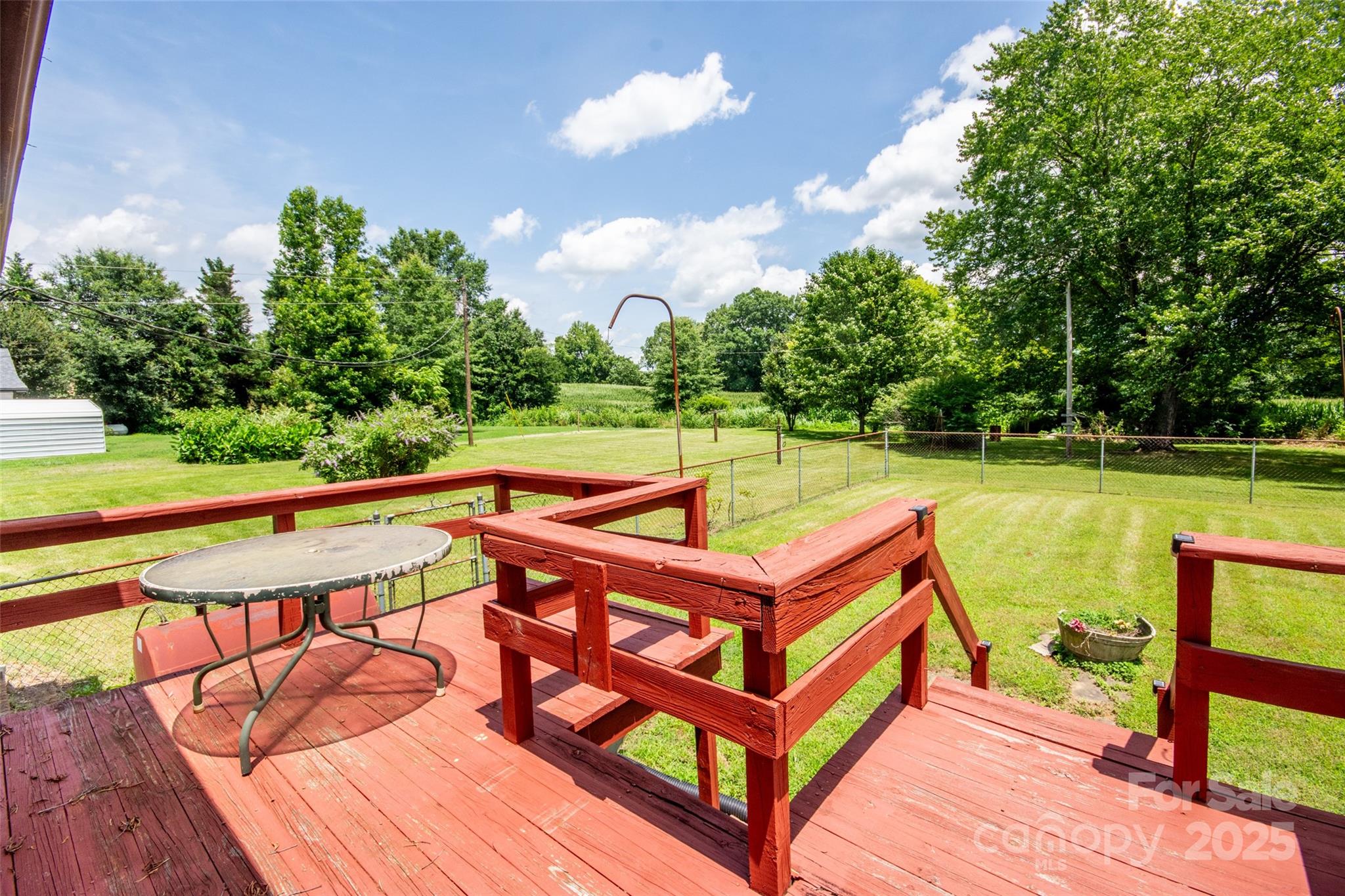 615 Bell Farm Road Statesville, NC 28625 - Photo 32 of 46 a view of a swimming pool with a patio and a yard