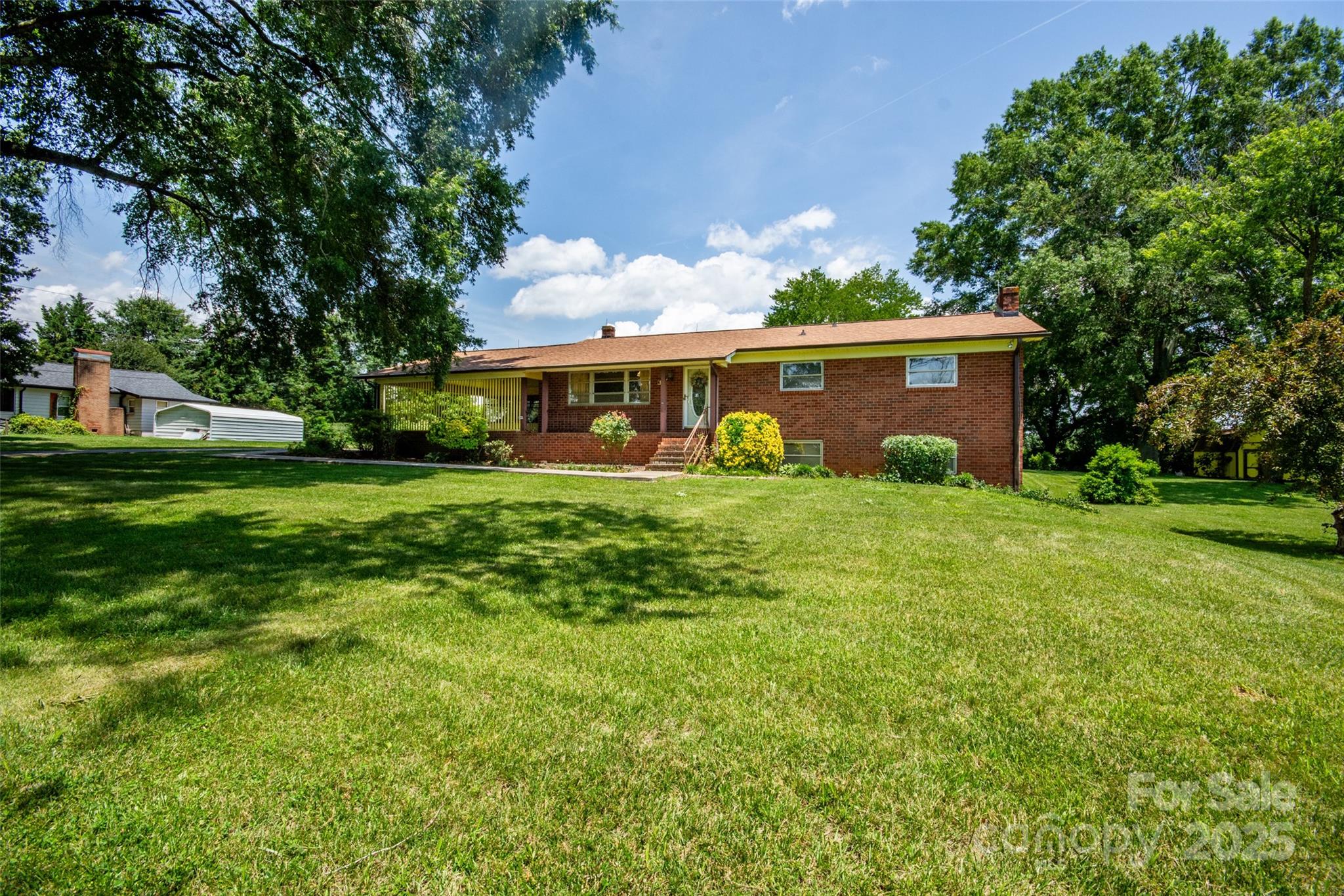 615 Bell Farm Road Statesville, NC 28625 - Photo 4 of 46 a view of a house with a yard