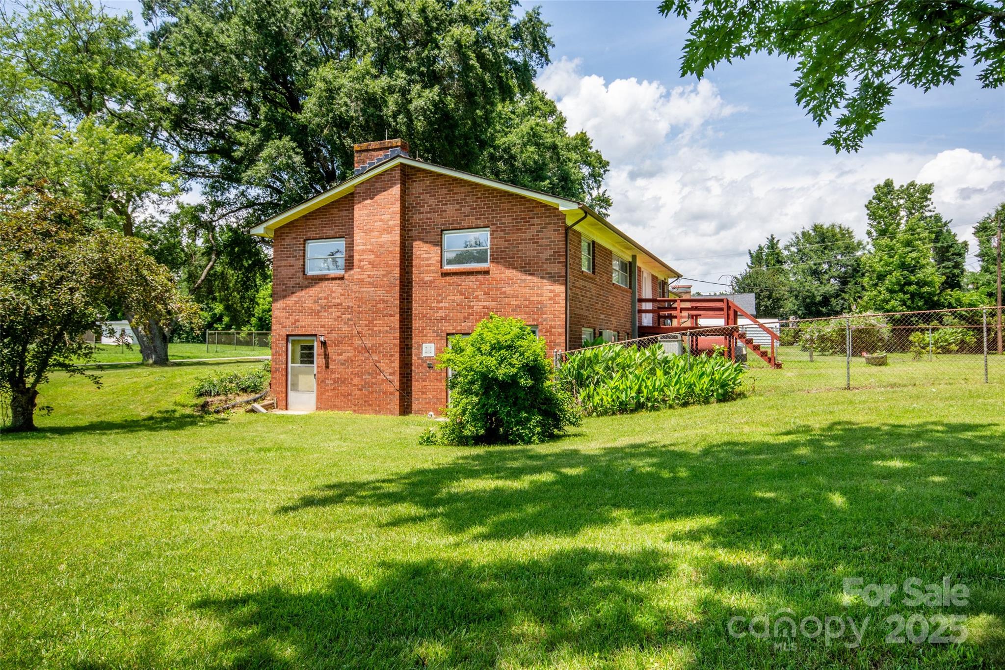 615 Bell Farm Road Statesville, NC 28625 - Photo 43 of 46 a view of a house with a yard