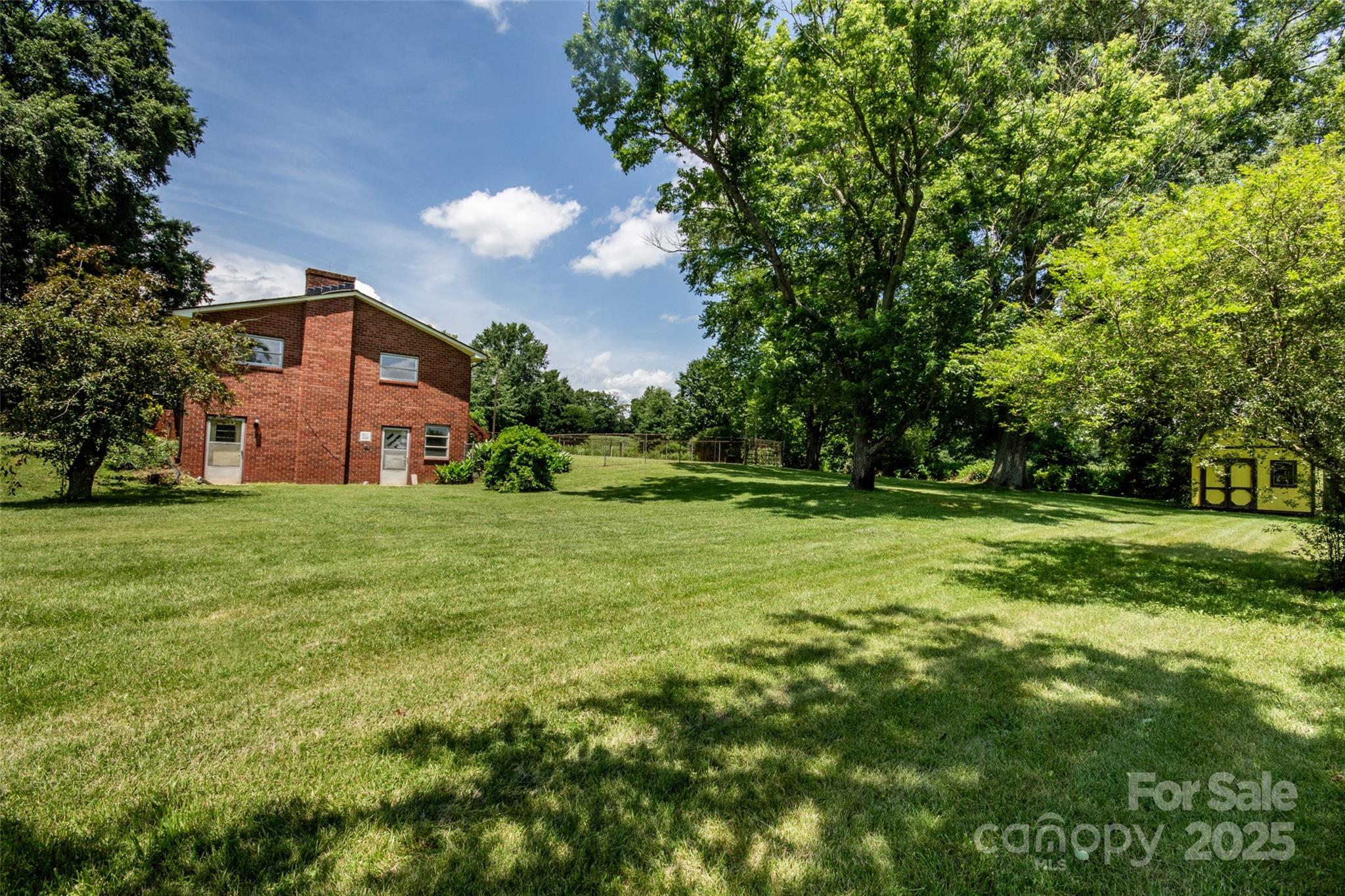 615 Bell Farm Road Statesville, NC 28625 - Photo 44 of 46 a view of a house with a big yard