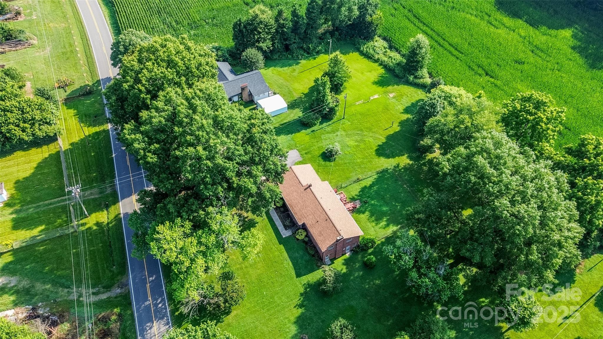 615 Bell Farm Road Statesville, NC 28625 - Photo 6 of 46 an aerial view of a house with a yard