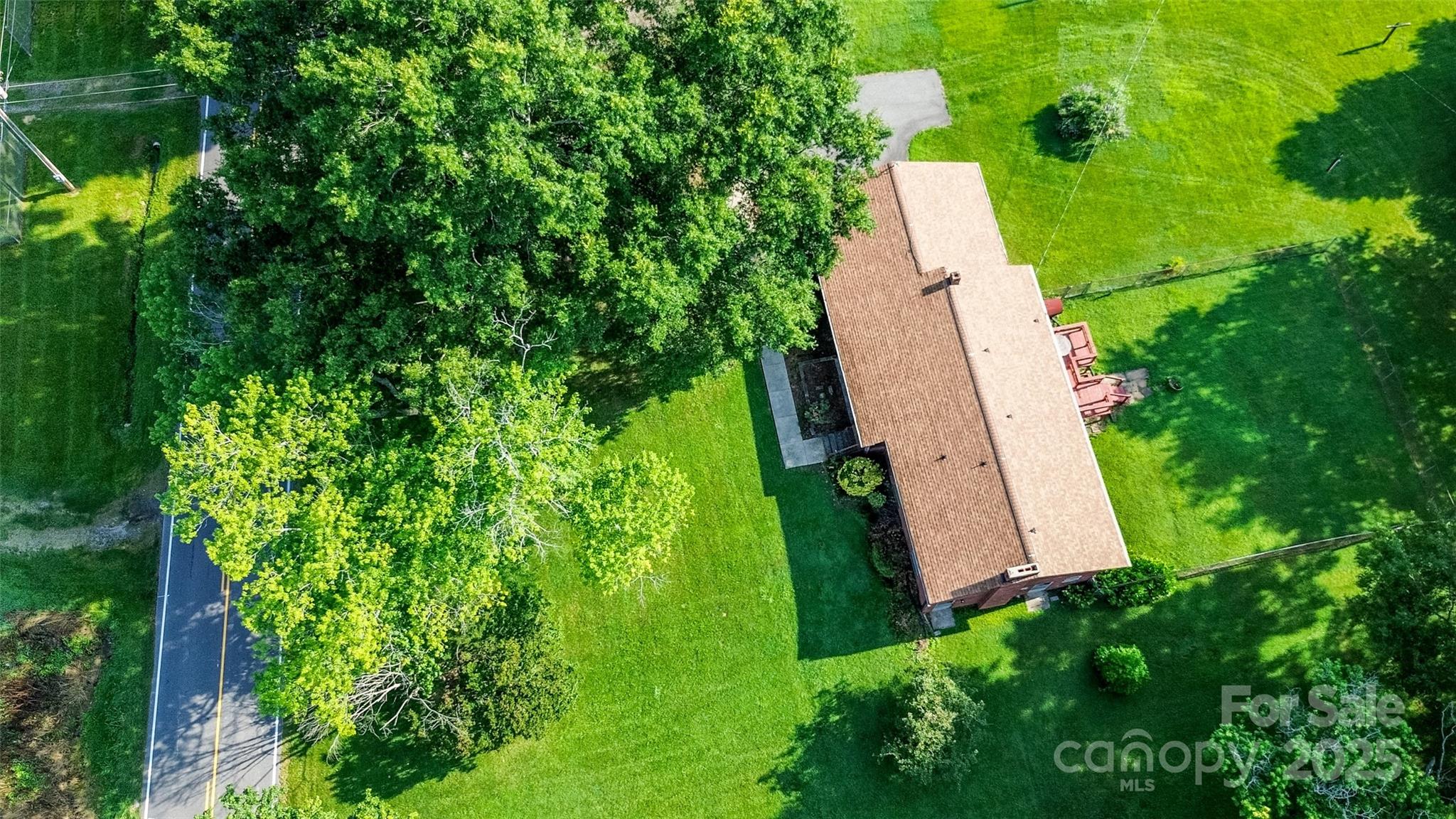 615 Bell Farm Road Statesville, NC 28625 - Photo 7 of 46 a view of a garden
